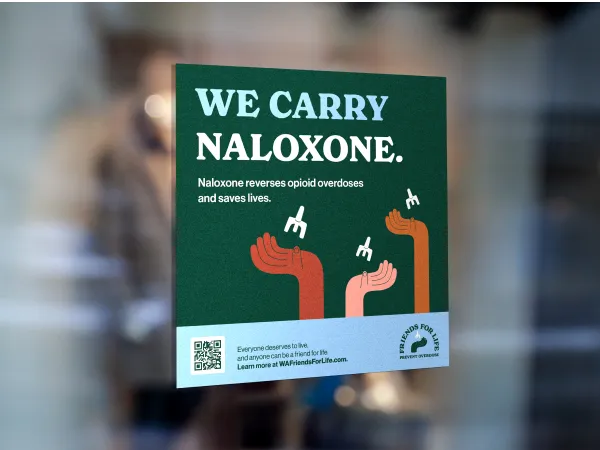 Image of a window cling with 3 hands holding Naloxone on a dark background